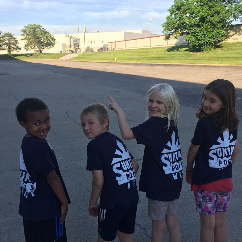 kids wearing suntime pools t shirts